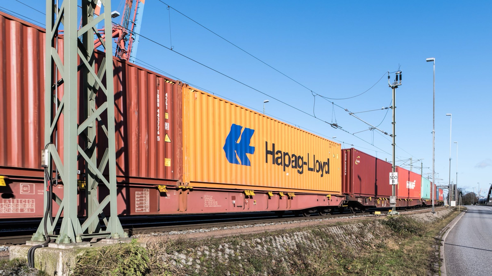 Standard ISO containers carried on European intermodal flat wagons in Hamburg